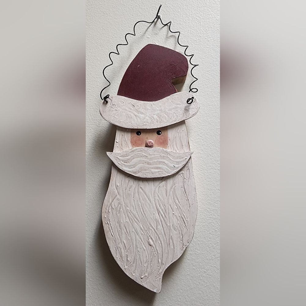 Vintage Wooden Santa Wall Hanging This piece has really neat wood carving